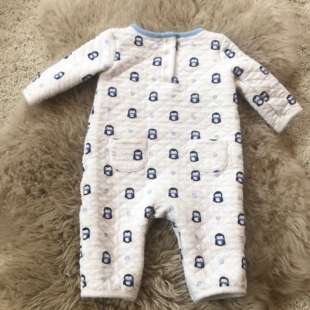 Quilted penguin baby onesie